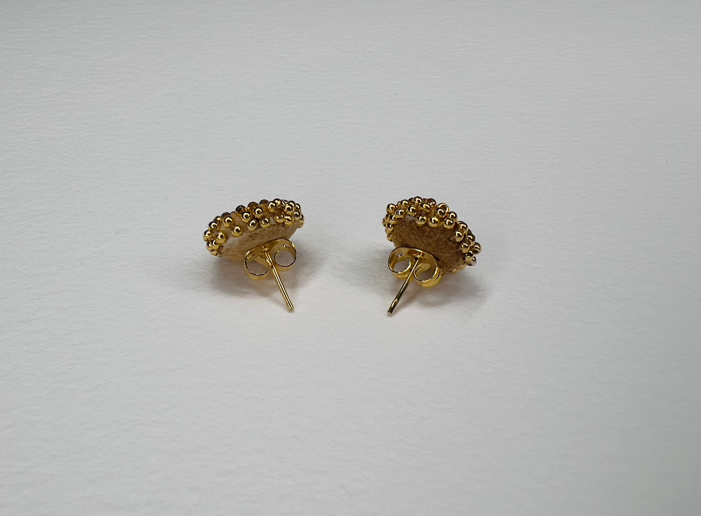 Gold studs